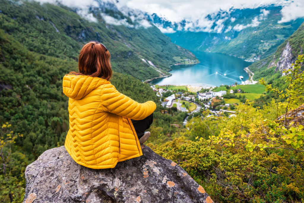 Woman Overlooking a Fjord in Norway