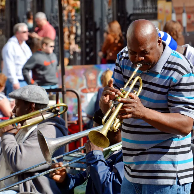 A local jazz musician performs in front of Jackson Square in the New Orleans French Quarter