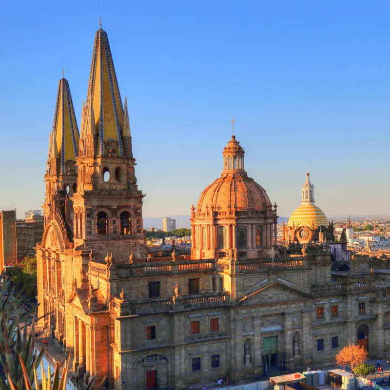 An aerial view of the Guadalajara Cathedral with the city in the distance