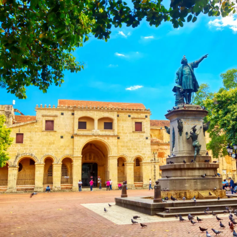 Columbus statue and Basilica Cathedral of Santa Maria la Menor in Santo Domingo Colonial zone