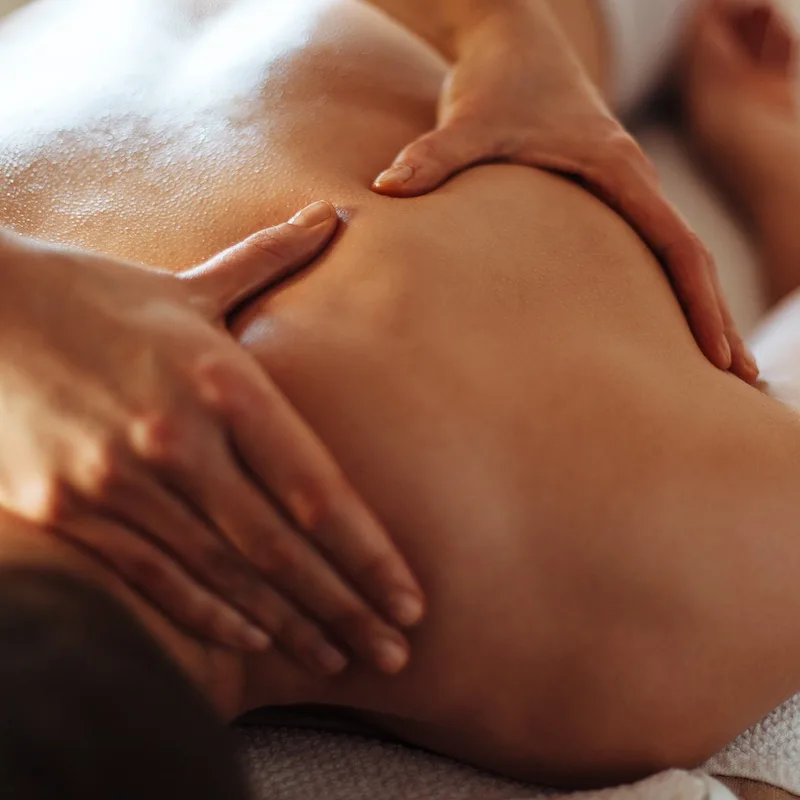 Hands Of A Woman Massaging A Man's Back, Unspecified Location, Wellness