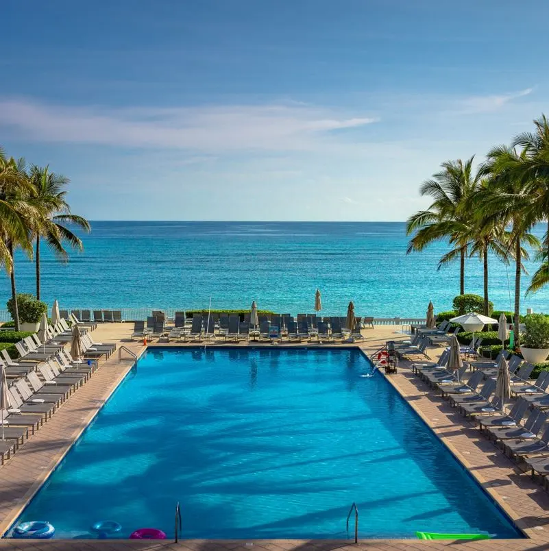 Montego Bay Jamaica pool with ocean in background