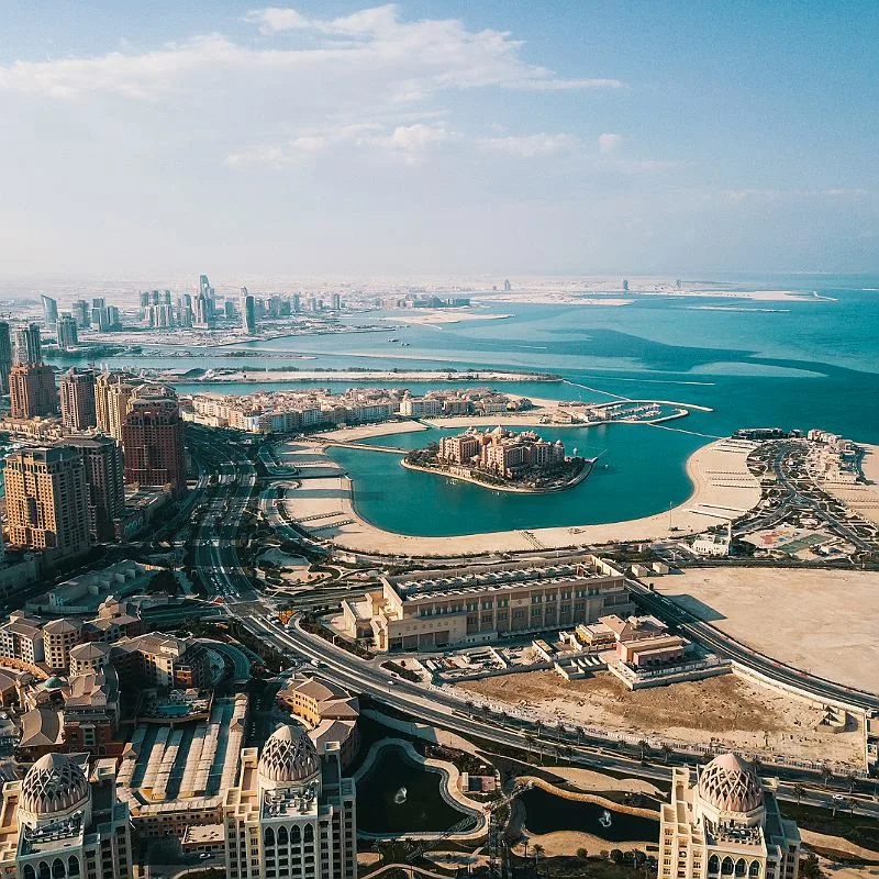 Aerial view of the Qatar skyline and harbour during the day