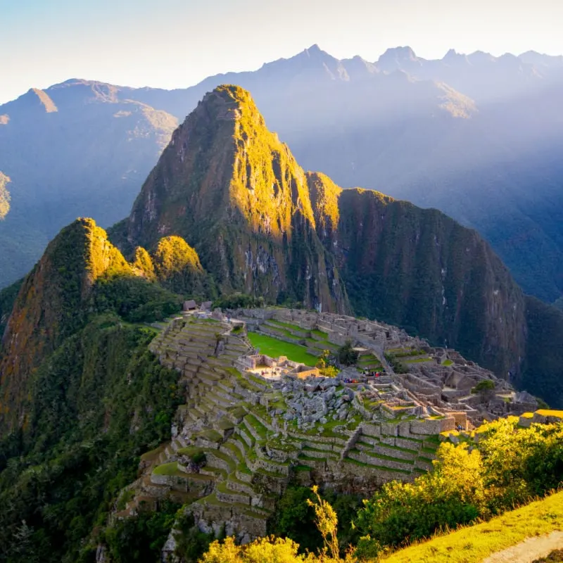 sunrise rays at Machu Picchu Peru