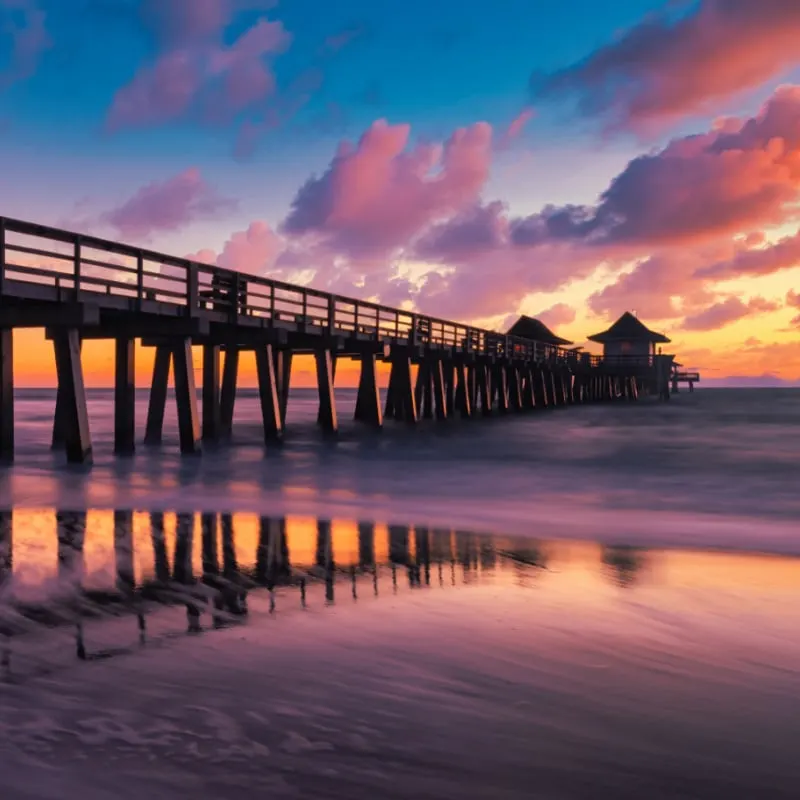 sunset at the fishing pier in naples florida