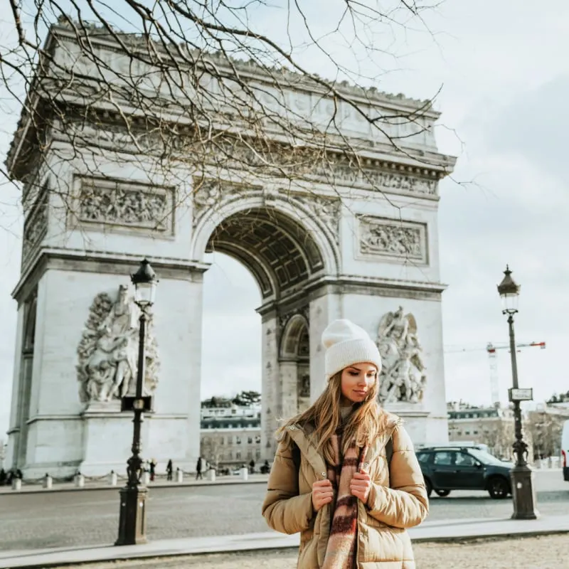 Woman walking in Paris in the winter